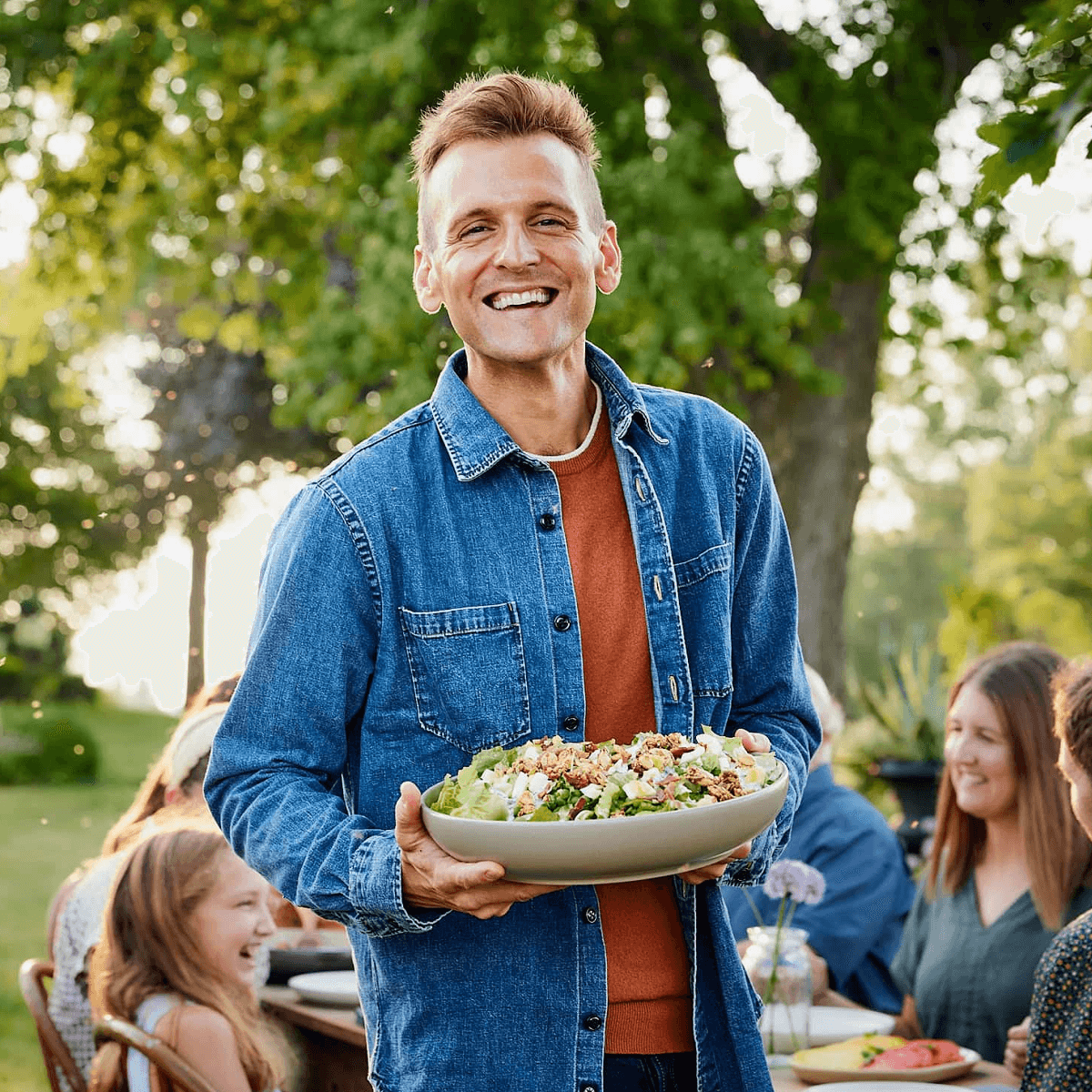 Kaleb Wyze holding a salad
