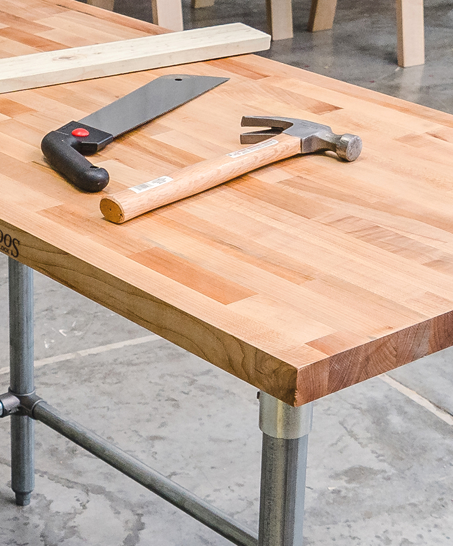 John Boos workbench with tools in a garage