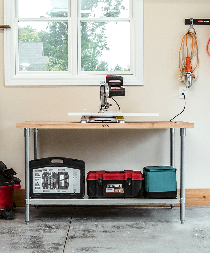 John Boos wood workbench countertop in a garage with tools